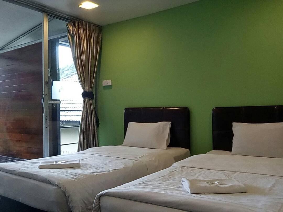J Residence Kampong Kundassan Værelse billede